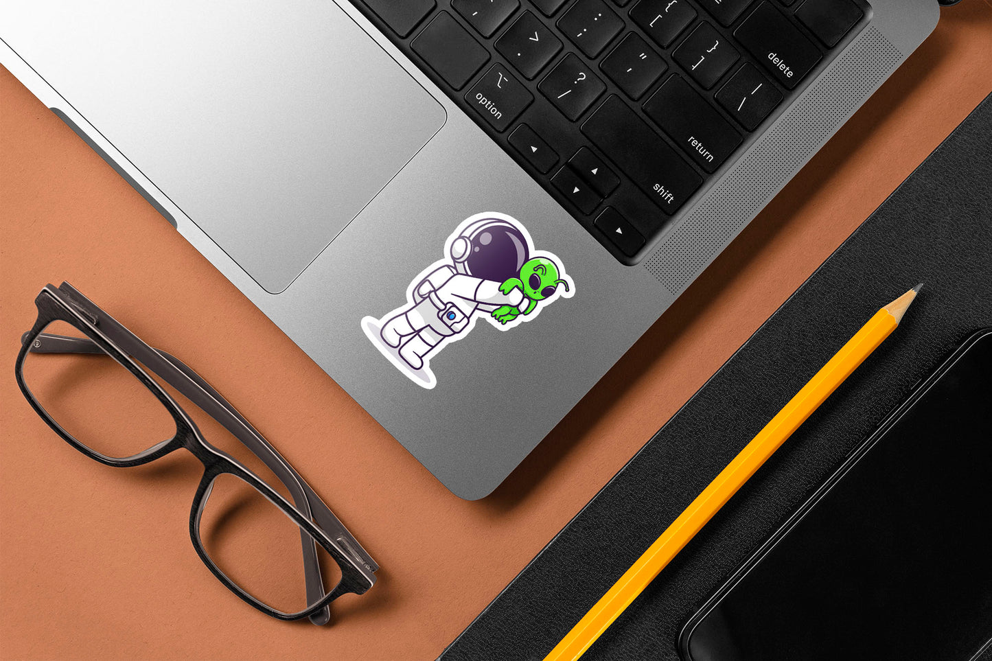 Astronaut Holding Baby Alien Sticker
